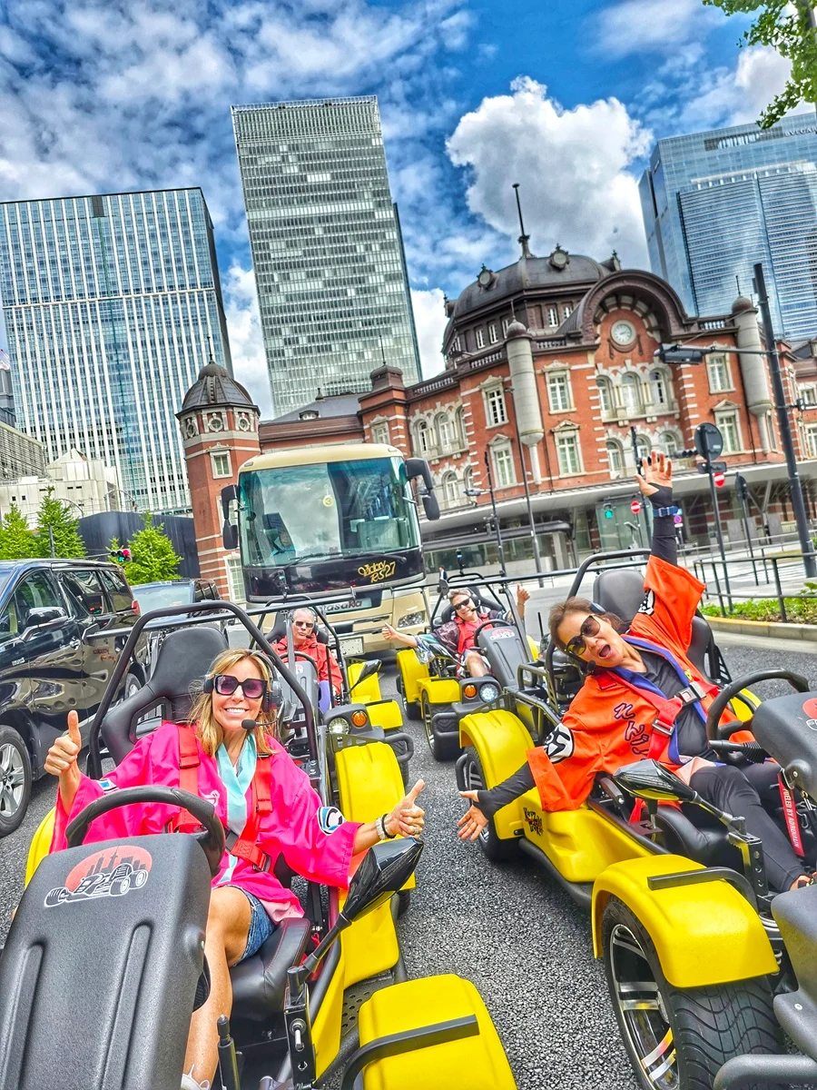 Kira Kira riders on a Tokyo route with Tokyo Station in the background
